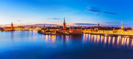 Scenic summer evening panorama of the Old Town (Gamla Stan) architecture pier in Stockholm, Sweden