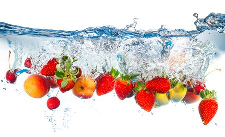 fresh fruits falling in water